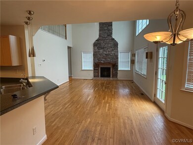 Unfurnished living room with light wood finished f