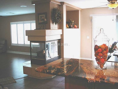 Property Photo. 3-Way Fireplace open to dining roo