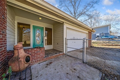 Entrance to property with a garage