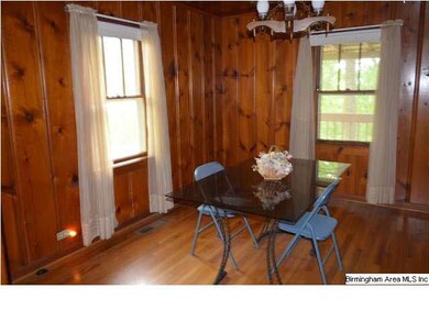 Dining area is right off the kitchen, and opens in