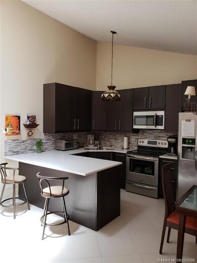 9915 Boca Gardens Trail unit D, Boca Raton, FL 33496 - photo 2