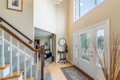 Two Story Entry Welcomes and Impresses.