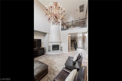 Living room with custom light fixture