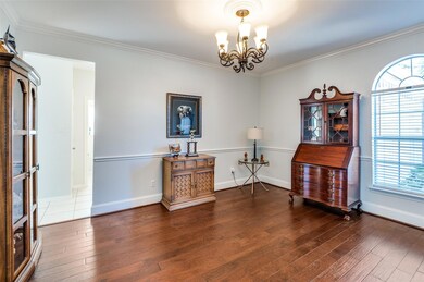 Miscellaneous room with an inviting chandelier, or