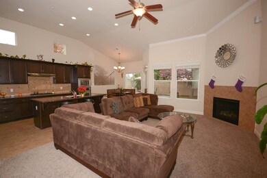 Family Room features decorative crown molding, ove