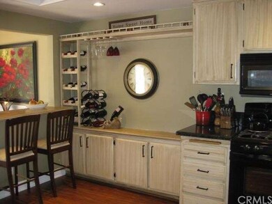 There is a Breakfast Bar in the kitchen as well as
