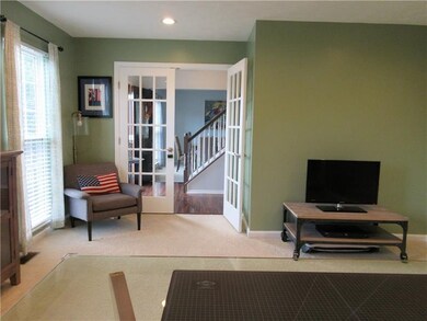 Lovely french doors lead you into the formal livin