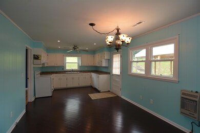 This large room connects the guest bedrooms.