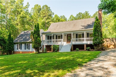 View of front of property with covered porch, a ch
