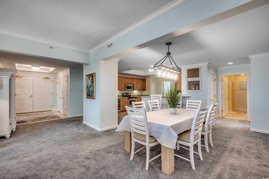 Dining area featuring carpet floors, visible vents