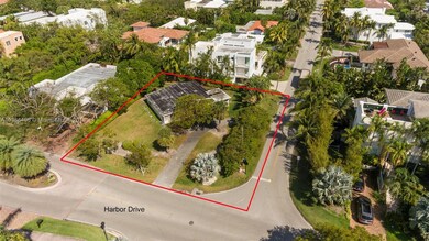 CORNER 9400 SQUARE FOOT LOT ON PRESTIGOUS HARBOR DR