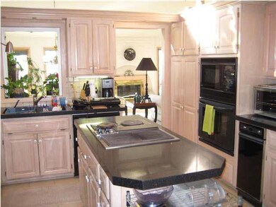 Custom oak cabinetry and tile floors, indirect and