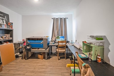 Spacious downstairs office or play room.  It's a perfect space for someone who works from home.