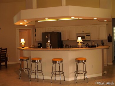 View of bar & kitchen.