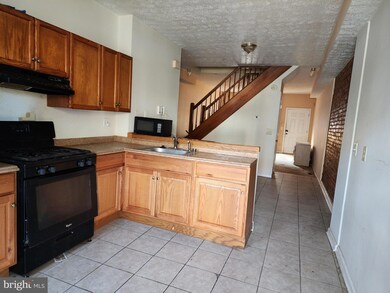 1621 N Gilmor St, Baltimore, MD 21217 - photo 5