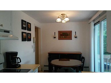 Dining Area. In kitchen has sliders to deck.