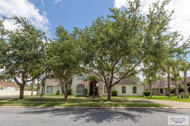 Front view with beautiful shade trees
