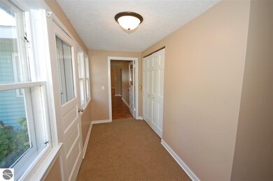 The spacious entryway with coat closet.