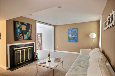 very airy with new carpet & fireplace