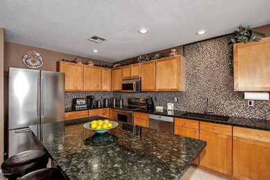 Granite counters w/ stainless appliances
