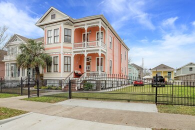 Fully fenced double lot yard with Main house and t