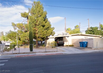View of front of home featuring driveway and stucc