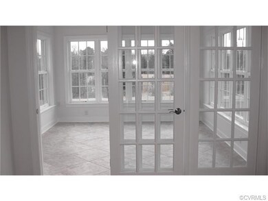 Sunroom w/Ceramic Tile Floor(Model Photo)