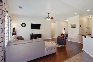 A comfortable Living Room (17.5'x13.5') with wood