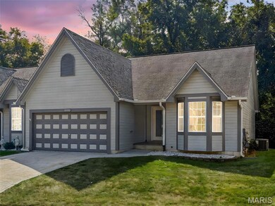 View of front of house with driveway, an attached garage, a lawn, and roof with shingles