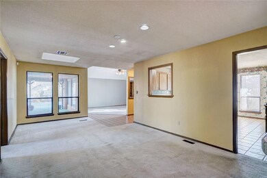 Formal dining area with view of back patio and liv