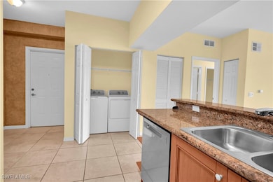 Looking toward condo front door entrance and laund