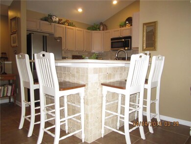 KITCHEN BAR (NOTE TILE UNDER BAR)