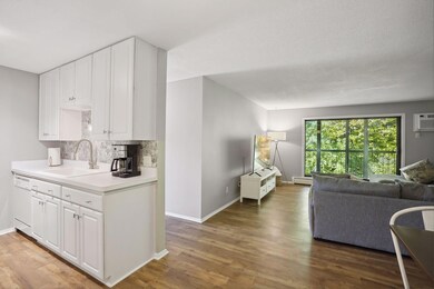 Kitchen and dining open to living space