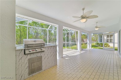 Unfurnished sunroom featuring a ceiling fan