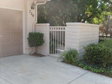 entrance gate leading to front of 720 Pebble Beach