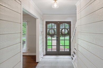 Interior space featuring french doors, hardwood / 