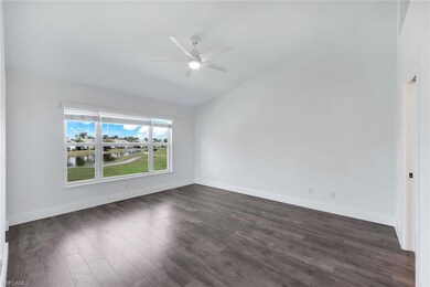 Spare room featuring ceiling fan, dark hardwood / 