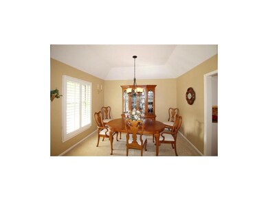 Formal dining room with plantation shutters