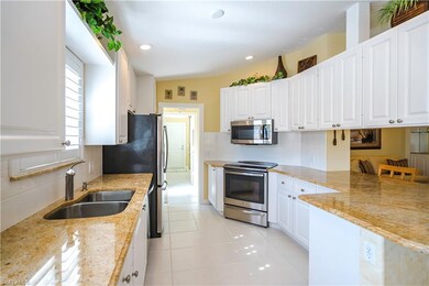 Sun filled Kitchen has Granite Counters and upgrad