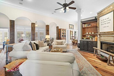 Living area adjacent to the kitchen and dining for