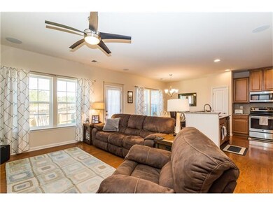 Living Room with Hardwoods and Surround Sound