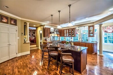 Open floor plan in kitchen with large granite isla