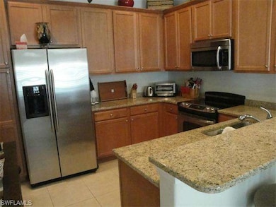 Elegant kitchen with upgraded cabinets, stainless steel appliances and granite counter-tops.