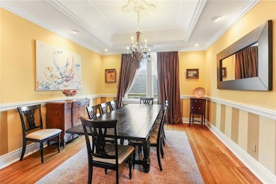 Stunning dining room with chair rail, coffered cei