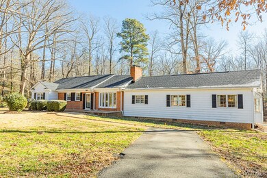 1970s addition to right side includes kitchen, din