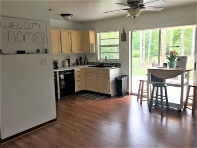 Eat In Kitchen and Sliding glass doors to large patio
