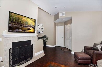 Cozy Fireplace and Coat Closet by Entry 