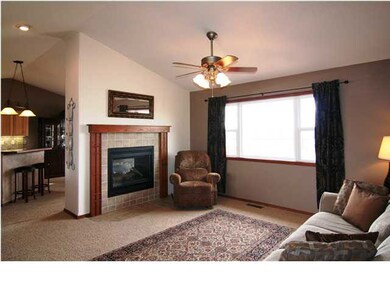 Two-way gas fireplace can be enjoyed in living roo