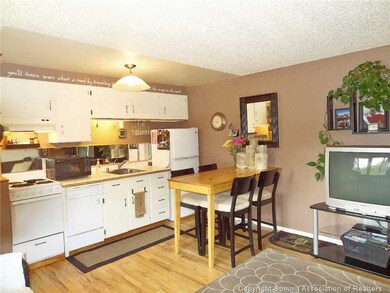 Kitchen. Nice upgrades including hardwood floors a