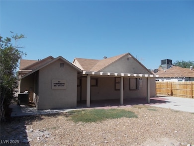 Back of house featuring a patio and stucco siding